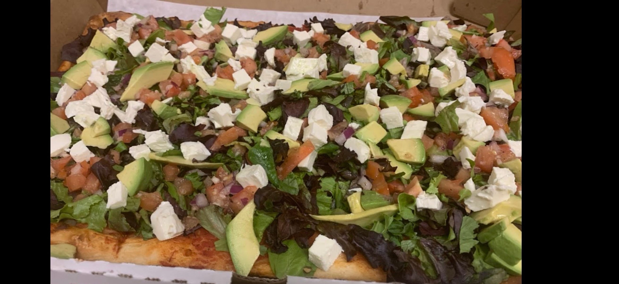 Grandma Mesclun Avocado Pizza.