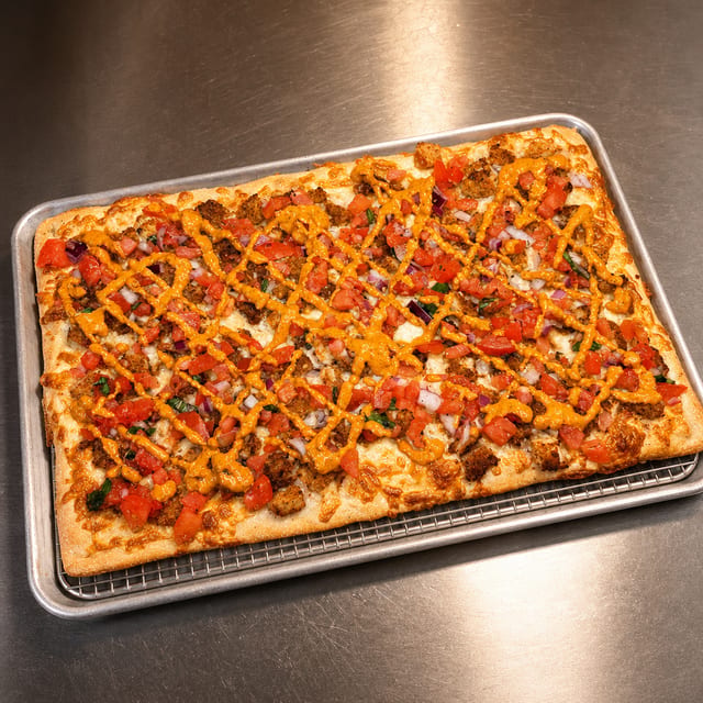 Grandma Chicken Bruschetta Pizza with Chipotle Sauce.
